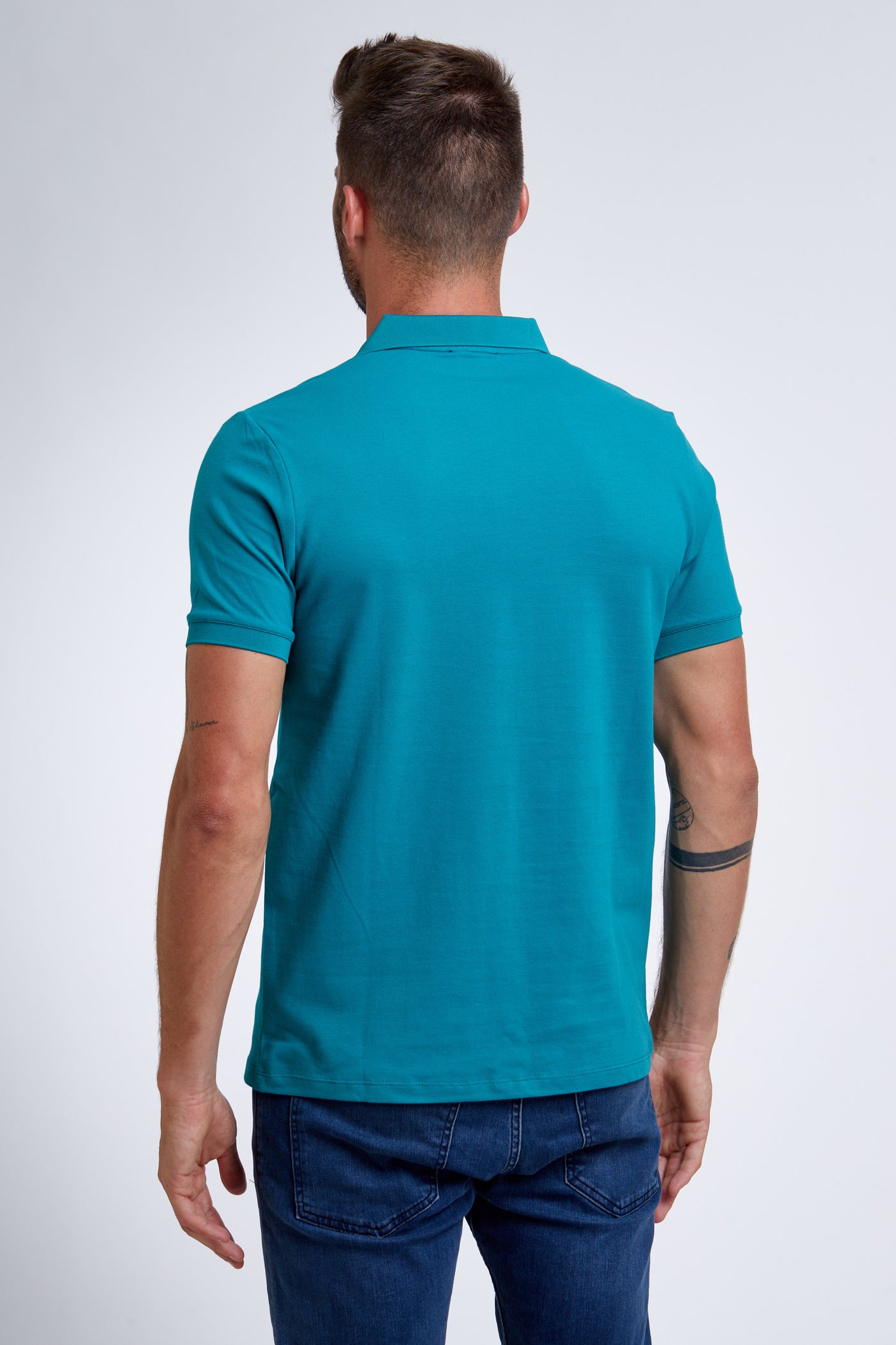 חולצת פולו שרוול קצר בצבע טורקיז